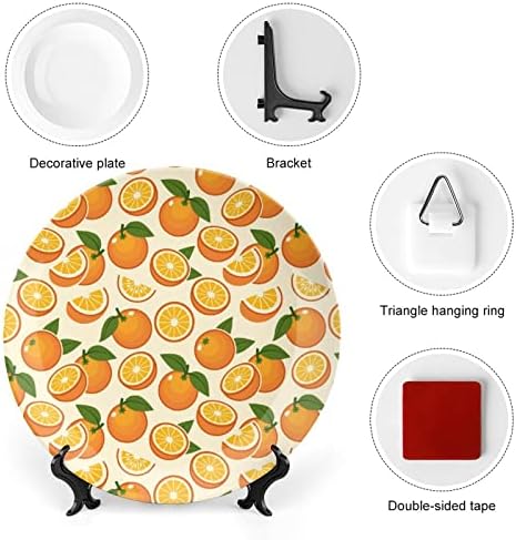Placas decorativas de fruta laranja de cerâmica com ornamentos pendurados em pratos de jantar